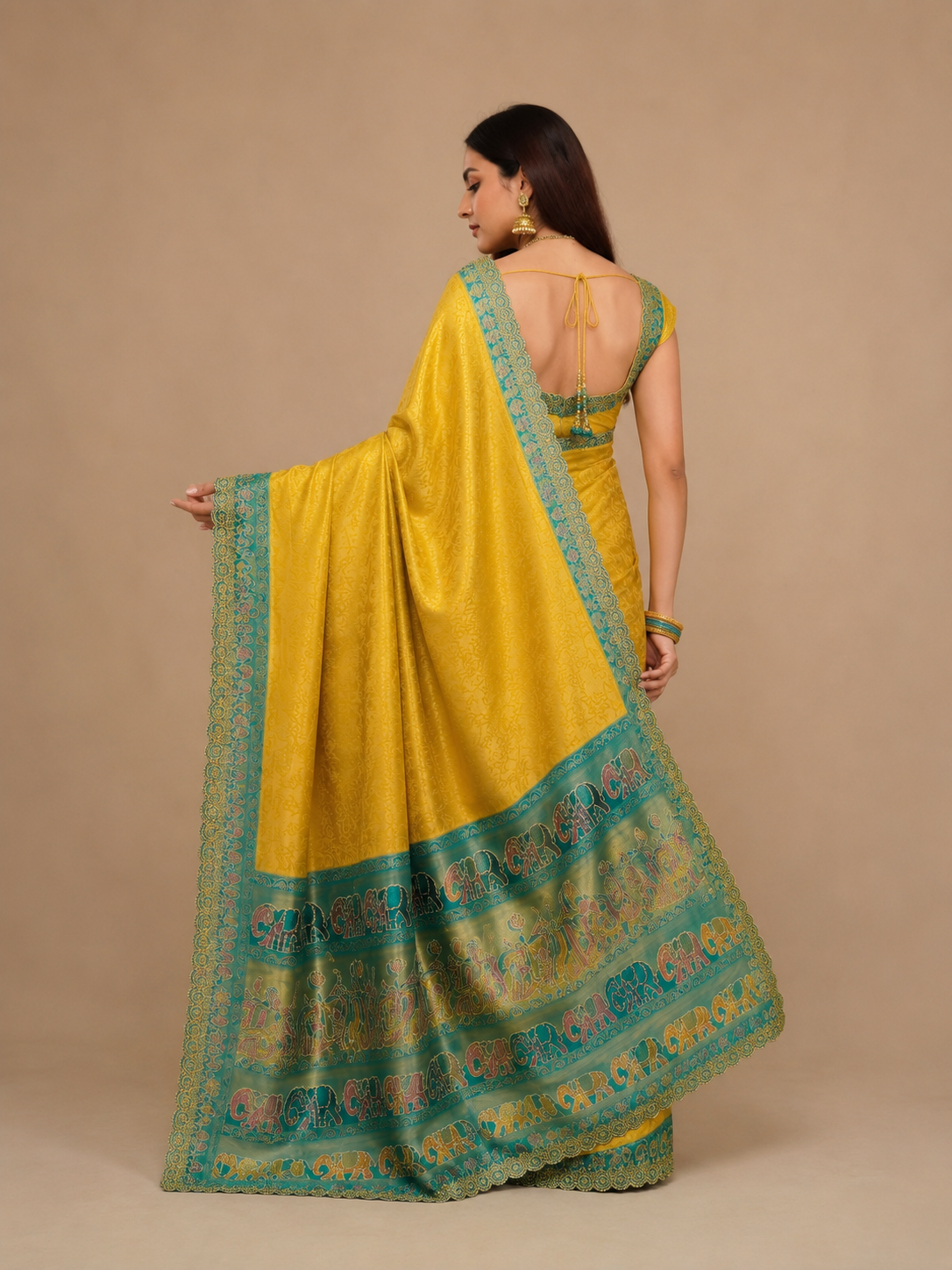 Mustard Yellow Haldi Special Silk Saree with Contrast Teal Border & Festive Motifs