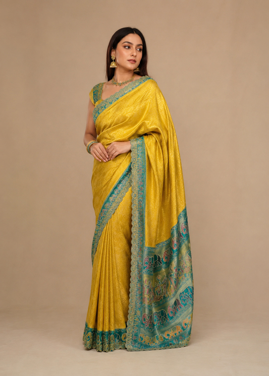 Mustard Yellow Haldi Special Silk Saree with Contrast Teal Border & Festive Motifs